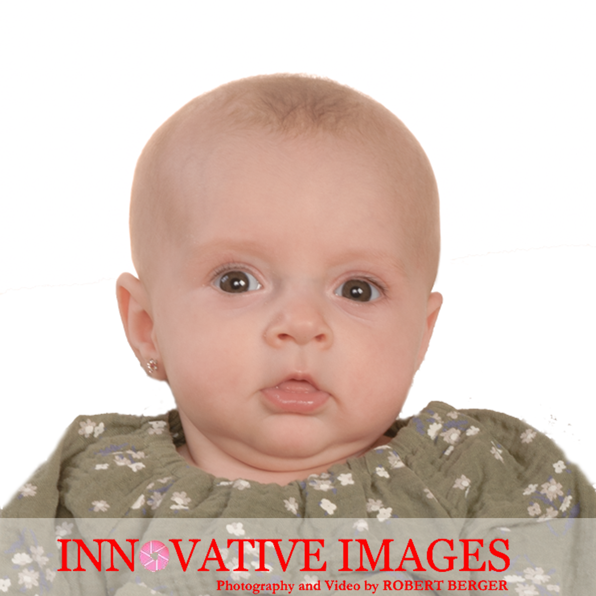 baby taking a passport photo in houston at Innovative Images Photography